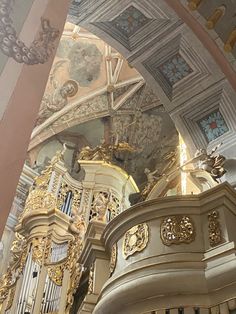 an ornately decorated church with gold and white decorations