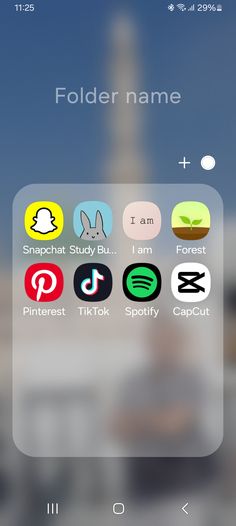 an iphone screen with the text folder name and icons on it, in front of a blurry background