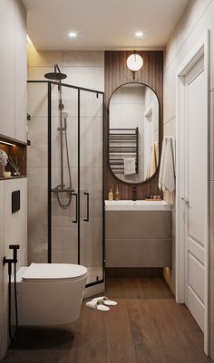 a bathroom with wood flooring and white walls