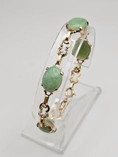 Vintage Ornate 14k Yellow Gold Jade Panel Bracelet  Item w #1438 - Clean and in good condition  - Marked 14k - 7.25 inches long with a spring ring clasp - Safety chain - Each Jade is approx 15mm Long and 12mm Wide -13.8 grams Welcome to Westgate Jewels!! We specialize in vintage estate, designer, and fine jewelry. Our shop consists of items that are estate, antique, and / or vintage conditions unless otherwise noted. This means that most items are prior owned and may have some imperfections such Gold And Green Jewelry, 12th Wedding Anniversary, 14kt Gold Jewelry, Wire Crochet Jewelry, Vintage Native American Jewelry, Bethlehem Pa, Vintage Designer Jewelry, Vintage Silver Rings, Everyday Bracelet