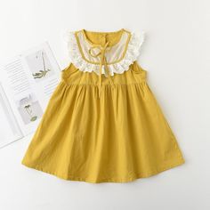 Toddler Girl Lace Collar Dress - PrettyKid Cute Cotton Sleeveless Dress For Playdate, Summer Cotton Sleeveless Dress For Playdate, Spring Dresses With Doll Collar Playful Style, Spring Dresses With Doll Collar In Playful Style, Cotton Sleeveless Dress For Summer Playdate, Sleeveless Spring Dress For School, Summer Sleeveless Dress With Ruffles For Dress-up, Sleeveless Spring Dresses For School, Spring School Cotton Dresses