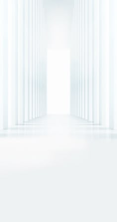 an empty white room with columns in the background