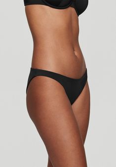 <div>Less coverage for maximum sun. This low rise Swim bottom is our go-to style for flattering, sculpted lines and minimal coverage. Our most minimal hip and</div> Sleek Second-skin Smoothing Bottoms, Sleek Second-skin Bottoms With Smoothing Detail, Sleek Second-skin Solid Bottoms, Solid Bottoms With Moderate Back Coverage And Minimal Stretch, Solid Color Bottoms With Moderate Back Coverage, Sleek Seamless Micro-elastic Bottoms, Sleek Solid Bottoms With Seamless Construction, Sleek Solid Bottoms With Minimal Stretch, Sleek Seamless Summer Bottoms