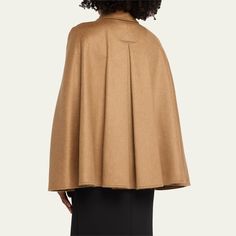 Max Mara "Obliqua" cape in virgin wool, cashmere, and leather Wing collar  Adjustable frame buckle  Hook-eye closures  Cape sleeves; buttons on cuffs  Slip pockets  Dry clean Made in Italy Luxury Wool Cape For Winter, Luxury Wool Winter Cape, Classic Wool Cape For Winter, Classic Wool Cape For Fall, Formal Wool Cape Outerwear, Wool Cape For Formal Occasions, Elegant Wool Cape For Fall, Classic Winter Cape For Work, Classic Winter Workwear Cape