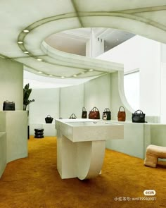 a room filled with lots of purses on display