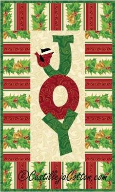 the joy christmas quilt pattern is shown in red and green