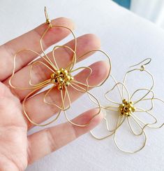 Flower Statement Earrings Handworked Modern Floral Giant Daisy Jewelry Handmade Large Wire Earrings - Etsy Spring Gold Metal Flower Earrings, Spring Gold Flower Earrings, Gold Metal Flower Drop Earrings, Gold Metal Drop Flower Earrings, Gold Metal Flower Charm Earrings, Handmade Gold Flower-shaped Hoop Earrings, Gold Flower-shaped Earrings For Spring, Gold Flower-shaped Nickel-free Hoop Earrings, Spring Gold Flower-shaped Earrings