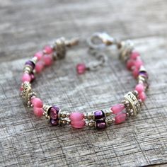 The bracelet is handmade using fresh water pearl and cateye. The fuchsia is a lively and feminine color, a nice blend of passion and tenderness The length of the earrings is 7-8 ¼ inches, 18-21. (excluding the length of hook) For matching earrings, please go to1: https://www.etsy.com/listing/95985512/earrings- For matching earrings, please go to2: https://www.etsy.com/listing/151339368/earrings?ref=shop_home_active For matching necklace, please go to: https://www.etsy.com/listing/118410657/neckl Dainty Pink Beaded Bracelets For Wedding, Delicate Pink Bracelets For Jewelry Making, Delicate Pink Pearl Bracelet For Gift, Delicate Pink Pearl Bracelet As A Gift, Delicate Pink Pearl Bracelet As Gift, Delicate Pink Pearl Bracelet Gift, Elegant Pink Hypoallergenic Bracelet, Pink Bohemian Hypoallergenic Jewelry, Pink Adjustable Bracelets For Bridesmaids