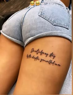 a woman with a tattoo on her thigh that says, don't worry for the people