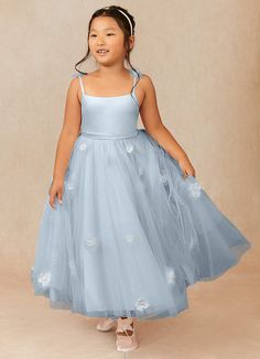 Doe is our adorable floral flower girl dress. She features a matte satin bodice with a poofy tulle skirt. We’ve added handcrafted 3D flowers along her ankle length skirt.