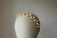 Gold crown with pearls. Bridal tiara. Wedding pearl crown ~MATERIALS~ -Czech glass white clear crystals -Austrian glass pearl -Gold filigree ~SIZE~ Height 1 inch (2,5 см) ~SHIPPING AND DELIVERY TIME~ This headpiece is ready to ship by 3-5 days The approximate time of shipment: - 10-16 days to Europe - 15-35 days to United States and other countries. ~IMPORTANT INFORMATION~ -Please allow as much time for shipping as possible before your important date ! I can't guarantee shipping time as its beyo Regal Structured Crown Wedding Headpiece, Regal Structured Crown Headpiece For Wedding, Regal Gold Headpiece For Wedding, Regal Wedding Headpiece With Structured Crown, Regal Gold Headpieces For Weddings, Regal Tall Crown Headpieces For Wedding, Regal Gold Wedding Headpiece, Regal Tall Crown For Wedding, Regal Crown Headpiece For Wedding