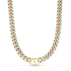 A stunning solid Miami Cuban chain is adorned with brilliant round diamonds in this luxurious necklace. Solid 18K gold Gold weight: 112.03 grams 8.2mm-wide Miami Cuban chain 6-3/8 cts. t.w. of handset diamonds, each with a color of G and clarity of SI2 The 22.0-inch necklace secures with a custom clasp Luxurious designs crafted in Italy Luxury Cuban Link Necklace With Diamond Accents, Luxury Cuban Link Necklace, Luxury Yellow Gold Diamond Cuban Link Necklace, Luxury White Gold Cuban Link Necklace With Diamond Accents, Luxury Round Diamond Cut Cuban Link Necklace, Gold Cubic Zirconia Diamond Necklace With Curb Chain, Luxury Diamond Cuban Link Necklace For Formal Occasions, Luxury Diamond Cuban Link Necklace For Formal Events, Luxury Chain Diamond Necklace For Anniversary