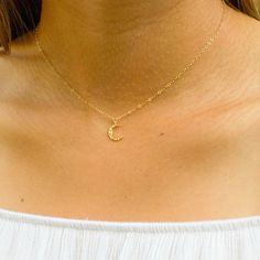 The moon is widely believed to be a feminine symbol, bringing immortality and eternity. Perfect gift idea for girlfriends, sisters or best friends! Choose between several lengths and we will make this necklace with care.…………………………………. Details: Size Small Moon: measures 10 x 8.5mm, Large Moon: 14.5mm x 12mm Pendant is Gold or Silver Plated Chain is 14k Gold Filled or Sterling Silver Average necklace length is 18" About Your Jewelry If you are not wearing your jewelry it is best to store it in a c