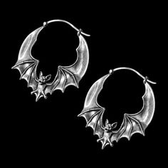 Elevate your style with the perfect blend of elegance and edge with our Flying Bat Hoop Earrings. These chic and charming earrings feature a captivating flying bat design, adding a touch of spooky flair to any outfit. Crafted in a sleek silver finish, they are approximately 1" in diameter, making them an ideal statement piece without being overpowering. The unique and secure bar-and-clasp closure ensures these earrings are suitable for both gauged and non-gauged piercings, offering a comfortable Bat Jewelry, Gothic Chic, Bat Earrings, Alternative Jewelry, Septum Jewelry, Goth Jewelry, Piercings Jewelry, Funky Jewelry, Cool Jewelry