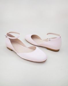 Inspired by a contemporary and refined ballet style flat. Classic silky satin round toe flat with removable ankle strap brings an elevated elegance and makes this a classy and elegant shoes for wedding, evening wear, or romantic date.DETAILS:UPPER: Synthetic upper and liningMATERIALS: Manmade outsoleImported Material Feminine Low Heel Ballet Flats, Elegant Pink Flats With Removable Insole, Spring Evening Ballet Flats With Ankle Strap, Feminine Almond Toe Ballet Flats For Formal Wear, Elegant Pink Evening Flats, Elegant Low Heel Ballet Flats With Removable Insole, Chic Ankle Strap Ballet Flats For Formal Occasions, Elegant Pointed Toe Flats With Ankle Strap For Spring, Elegant Ballet Flats With Removable Insole And Low Heel