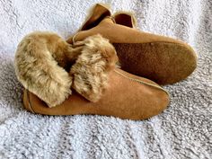 The slippers are made of natural sheep leather, the interior is insulated with soft sheep fur. The bottom of the slippers is finished with durable suede leather, which makes the slippers soft and flexible when walking. The slippers are warm and at the same time very light. When wearing it, you feel as if your feet were wrapped in warm and delicate down. The cut of the slippers is suitable for narrow and medium-width feet. The slippers fit perfectly on the feet. The slippers can be used on any fl Shearling Indoor Slippers, Suede Slippers With Plush Lining And Round Toe, Comfortable Indoor Slippers With Leather Sole, Shearling Slip-on Slippers With Plush Lining, Suede Slippers With Leather Sole And Flat Heel, Indoor Shearling Slippers With Faux Fur Lining, Sheepskin Slippers With Plush Lining And Round Toe, Winter Soft Sole Slip-on Slippers, Winter Slip-on Slippers With Leather Sole