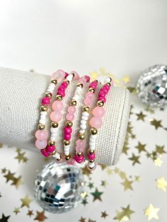 Pink Gold and White Beaded Bracelet, Hot Pink Jewel Bracelet with Flower Bead, Beaded Bracelets Sets, Christmas Stocking Stuffer, Teen Girl Gift, Butterfly, Seed Bead Bracelet, Kids Jewelry, Little Girls Bracelet, Preteen Accessories Absolutely gorgeous pink, gold and white bracelet! Super cute addition to any bracelet stack or even on its own. Pictures do not do this bracelet justice. This bracelet matches our pink mama + mini bracelet.  D E T A I L S - made to order on a durable stretch cord - Hot Pink Gifts, White Bead Bracelet, Jewel Bracelet, Bracelets Sets, White Beads Bracelet, Mini Bracelet, Rosa Gold, Pink Jewels, Jewelry Accessories Ideas