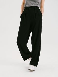 Details: Classic black casual pants Pleated at the waist Mid-rise waist Side pockets lightly tapered leg Acetate fabric with bright appearance and soft touch Materials & Care: Vinyl Fiber 67.2%, Polyester 32.8% Hand wash | Dry clean Do not bleach Size & Fit: Model is 5'7", Bust 32, Waist 24, Hips 35, wearing a size S Item #: WM2PA13 Sleek Black Wide Leg Pants With Pockets, Sleek Tapered Leg Spring Pants, Sleek Straight Pants With Elastic Waistband, Sleek Bottoms With Elastic Waistband And Straight Pants, Sleek Black Dress Pants With Pockets, Black Tapered Bottoms For Spring, Sleek Spring Pants With Pockets, Sleek Spring Bottoms With Welt Pockets, Sleek Black Ankle-length Wide Leg Pants