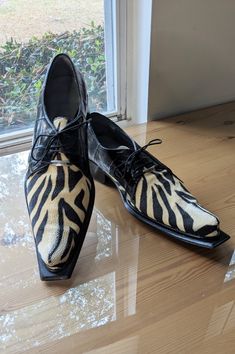 "* Custom men's lace up oxford shoes in a black and white zebra print * Expertly crafted Italian made in the hills of Como Italy * Outstanding craftsmanship; stacked leather heel and leather soles * Excellent condition...skins are supple * Rare one-of-a-kind...stingray and eel skin * Mauri Brand...these retail for $1300 * Great gift for the man in your life whether he is a rockabilly dude, rockstar or nerd...these shoes will bring out the animal in him and you will not be disappointed. MEASURES: Lace Up Oxford Shoes, Italy Men, Como Italy, Zebra Pattern, Oxford Shoes Men, White Zebra, Mens Oxfords, The Vamps, Stingray