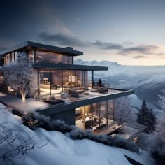 a modern house on top of a snowy mountain