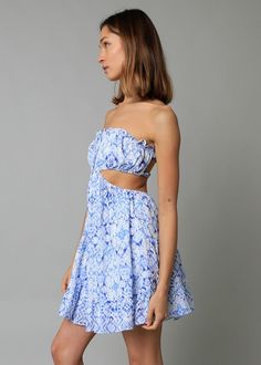 Final Sale - Get it before it's gone! Get ready for a fun day in the Maeve White and Blue Floral Strapless Dress! The white and blue floral cotton fabric forms a strapless cutout tie bodice with a straight neckline, cutout waist, and open back with elastic waistbands. Attached mini skirt with a ruffle hem. DETAILS & CARE 100% Cotton, Polyester Lining. Hand wash cold or dry clean. Imported. Floral Strapless Dress, Blue Floral Print Dress, Boho Pink, Strapless Floral Dress, Pink Boho, Fun Day, Straight Neckline, Boho Print, Dress Boho