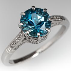 This wonderful ring is centered with one (1) round modified brilliant cut natural aquamarine weighing 1.30 carats that is set into an eight-prong setting. The top and side faces are accented with a total of forty-six (46), bead set, round brilliant cut diamonds. The ring measures 7.8mm at the top, rises 7.3mm above the finger, tapering to 1.4mm wide and 1.0mm thick at the base of the shank. This ring is currently a size 5 7/8. Aquamarine Stone Ring, Aquamarine Ring Vintage, Cute Engagement Rings, Vintage Cocktail Ring, Daughter Jewelry, Aquamarine Jewelry, Aquamarine Ring, Ring Ideas, Bead Set