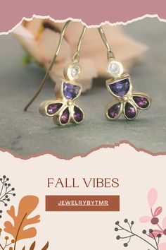 Embrace the intricate elegance of these unique gold earrings adorned with zircon, amethyst, and garnet. With their charming details and colorful drop-dangle design, they’re the perfect finishing touch for any evening ensemble. Thoughtful gift for her. Handmade with care, they bring a touch of artistry to any occasion.

#GemstoneJewelry #HandmadeJewelry #AmethystEarrings #GarnetEarrings #DangleEarrings #ChicJewelry #UniqueEarrings #ColorfulJewelry #Fallearing #AutumnAccessories #AutumnJewelry Gold Plated Drop Earrings With Gemstone Accents, Gold-plated Yellow Gold Earrings With Gemstone Accents, Dangle Earrings With Gemstone Accents And Cubic Zirconia, Dangle Earrings With Gemstone Accents In Cubic Zirconia, Dangle Earrings With Cubic Zirconia And Gemstone Accents, Gold Earrings With Gemstone Accents Fine Jewelry, Gold Earrings With Gemstone Accents In Fine Jewelry Style, Elegant Purple Earrings As A Gift For Her, Gold Plated Earrings With Gemstone Accents