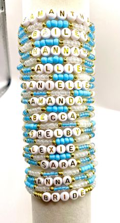 Help your whole group match in style! --- Perfect for bachelorette parties, work groups, wedding gifts, sports teams, fundraisers and more. Choose the option to customize with each group memebers name and other fun added bracelets or words.  🌈 **Customizable Choose from a variety of colors, styles, and personalized names to make your bracelet truly one-of-a-kind. 💎 **High-Quality Beads We use only the finest materials to ensure your bracelet stands the test of time. 🎉 **Gift-Ready Packaging Each bracelet comes in a beautiful gift bag, ready to surprise and delight. --- - Custom Named Beaded Bracelets - Handmade Jewelry Michigan - Personalized Bracelets - Unique Gifts for Her - Shelby Nichole Co Bracelets - Crafted with Passion - High-Quality Beaded Bracelets - Gift for All Occasions --- Personalized White Beaded Bracelets For Party Favors, Customizable White Beaded Bracelets For Party Favors, Personalized Friendship Bracelets As Party Favors, Personalized Adjustable Name Bracelet For Party Favors, Personalized White Friendship Bracelets As Party Favors, Personalized White Friendship Bracelets For Party Favors, Customizable White Bracelets For Birthday, Custom Name Beaded Bracelets For Party Favors, Customizable Adjustable Beaded Bracelets For Party Favors