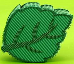 an image of a green object that looks like it is made out of plastic material