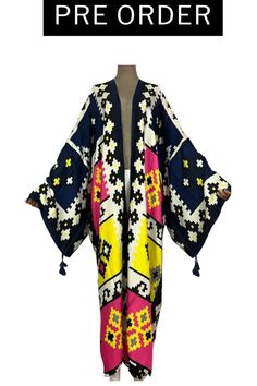 This kimono is everything and it's arriving just in time for the transition from summer to fall. Our Renee Cotton Style Multi-Color Kimono is a versatile addition to your wardrobe. Wear it as a chic cover-up at the beach, a stylish layer over your casual outfit, or a statement piece for a night out. The styling possibilities are endless, allowing you to express your unique fashion sense. Order now and get your kimono for the introductory price of $59.00 plus shipping. One Size Long Cover-up For Day Out, Multicolor Summer Kimono For Beach Cover-up, Bohemian Multicolor Beach Cover-up Robe, Multicolor Printed Kimono For Day Out, Free Size Kaftan For Spring Beach Cover-up, Multicolor Wrap Kaftan For Beach, Chic Multicolor Spring Kaftan, Multicolor Open Front Kimono For Day Out, Multicolor Kimono Beach Cover-up