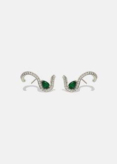 —The Trace Collection Crafted of solid 18K gold, the Emerald Trace Earring features a soft fluid line that cascades around the ear. Sold as singles. Please specify preferred side. For a pair, add a Left and Right to your order. 1" in length | 0.19tcw (F/G color, VS clarity) 0.40ct Pear Cut Emerald Available in Yellow Gold, White Gold, Rose Gold Custom variations can be made with alternative stone sizes. For inquiries: bespoke@katkimfinejewelry.com Please note: All our pieces are made to order an Elegant Cubic Zirconia Ear Climbers, Elegant Single Sterling Silver Ear Climbers, Elegant Sterling Silver Ear Climbers, Elegant Silver Teardrop Ear Cuff, Elegant Diamond Pierced Ear Cuff, Elegant Cubic Zirconia Ear Cuff With Matching Earrings, Elegant White Gold Ear Climbers For Pierced Ears, Elegant Single Cubic Zirconia Ear Climber, Elegant Sterling Silver Pierced Ear Climbers