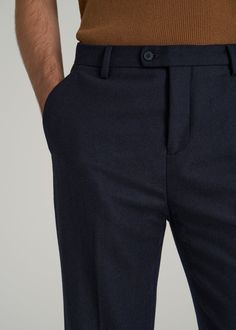 Tapered Wool Pants for the Guy with Style Elevated Slacks for Tall Men Step into comfort and class with our Wool Pants for Tall Men, specially sized for guys who stand above the rest. These full-length men's tall pants offer a tapered fit and a mid-rise, ensuring comfort without compromising on style. The pre-washed fabric minimizes shrinkage, while slash and double welt pockets provide ample storage for your essentials.• Tapered fit for a modern look• Mid-rise for comfortable wear• Slash and do Navy Business Casual Pants With Straight Hem, Navy Business Casual Bottoms With Straight Hem, Navy Straight Hem Pants For Business Casual, Navy Bottoms For Business Casual With Straight Hem, Navy Business Casual Pants With Welt Pockets, Navy Pants With Welt Pockets For Business Casual, Navy Business Bottoms With Welt Pockets, Navy Business Bottoms With Pockets, Navy Straight Leg Pants With Welt Pockets