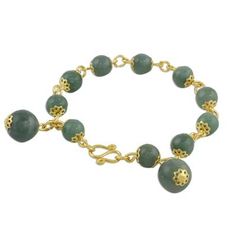 Adorn your wrists with timeless jade! Somluck Komolmith of Thailand handcrafts this beautiful design. Combining 18k gold plated brass with cool gemstone globes her bracelet features jade beads and a hook clasp. Gold Jade Beaded Bracelets For Spiritual Purposes, Gold Jade Beaded Bracelets For Spiritual Wear, Gold Jade Bracelets With Natural Stones, Spiritual Gold Jade Beaded Bracelets, Elegant Aventurine Bracelet Jewelry, Elegant Aventurine Bracelet, Gold Agate Bangle Jewelry, Gold Agate Bangle, Yellow Gold Jade Round Beads Jewelry