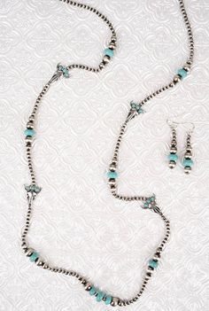 This fun necklace is great for layering! Nickel-free Turquoise Costume Jewelry, Beaded Turquoise Metal Jewelry, Turquoise Dangle Necklace Nickel Free, Turquoise Dangle Nickel-free Necklace, Turquoise Beaded Metal Jewelry, Sterling Silver Turquoise Jewelry With Lobster Clasp, Southwestern Nickel-free Turquoise Jewelry, Southwestern Turquoise Nickel-free Jewelry, Southwestern Turquoise Metal Jewelry