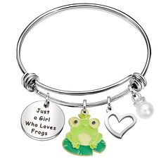 a silver bracelet with a frog on it and a heart charm that says just a girl who loves frogs