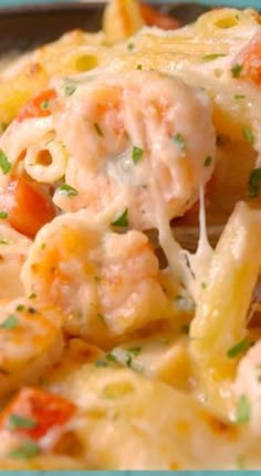 pasta with shrimp and tomato sauce in a bowl