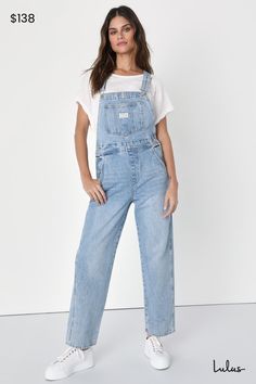 The Levi's Vintage Medium Wash Overalls are a tried and true staple that we know you're going to love! Sturdy denim (in Levi's What A Delight wash) shapes these classic overalls that have a front bib with a patch pocket and adjustable straps that form into a modified racerback. A seamed waist tops relaxed fit straight leg bottoms with two front pockets and two back pockets. Branded button closures at the hips. Red logo tag at back. Fit: This garment fits true to size. Length: Ankle length. Size Light Wash Cotton Overalls With Straight Leg, Light Wash Straight Leg Cotton Overalls, Light Wash Cotton Straight Leg Overalls, Trendy Light Wash Straight Leg Overalls, Denim Blue Relaxed Fit Overalls, Trendy Light Wash Overall Bottoms, Relaxed Fit High Rise Light Wash Overalls, Trendy Light Wash Overalls, Levi's Cotton Overalls In Medium Wash