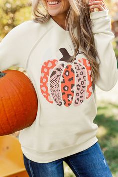 Halloween Pumpkin Graphic Pullover Sweatshirt White Graphic Print Sweater For Fall, Cute Long Sleeve Orange Top, Cute White Sweatshirt For Fall, Cute White Fall Sweatshirt, Cute Fall T-shirt, Casual White Sweatshirt For Halloween, Orange Crew Neck Sweatshirt For Fall, Orange Long Sleeve T-shirt For Fall, White Long Sleeve T-shirt For Fall