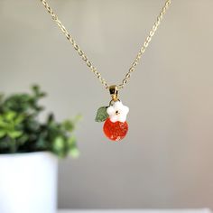 Can't find your perfect fit length? Do have material requirements? We offer custom orange fruit necklace. Your satisfaction is our priority. How to customize? You choose the design; we hand make the necklace for you. Elevate your style with this exquisite orange flower pendant necklace. The pendant is delicately crafted with intricate details, capturing the beauty of nature in its design. You offer various colors of orange. Lightweight and comfortable to wear, it's the perfect accessory to compl Coworker Appreciation, Fruit Necklace, Fruit Orange, Rain Design, Orange Citrus, Anniversary Necklace, Orange Necklace, Sweet Fruit, Orange Fruit