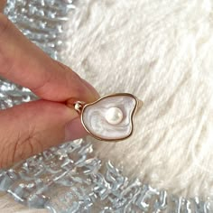 Stunning real natural freshwater pearl and shell statement cocktail chunky ring, open adjustable ring. White shell signet with natural pearl paved in the center, 14k rose gold plated finish. Super unique and creative, elevate your dainty vibes, easy to stacking. Perfect gift to treat yourself and your friends/family, you will get lots of compliments for sure! ♥ All of our jewelry are carefully handmade with delicate and exquisite details, all designed and made in Manhattan, New York. 💎 Features Adjustable Rose Gold Open Pearl Ring, Rose Gold Open Pearl Ring, Made In Manhattan, Ring Y2k, Mother Of Pearl Ring, Chunky Ring, Shell Ring, Beautiful Gift Wrapping, Chunky Rings