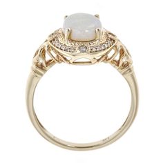 Give her this unique, regal jewelry from Gin & Grace. A colorful display and chic design showcases Natural opal gems and glistening diamonds. The pretty ring is gleaming and made of 14k yellow gold. Gemstone colors: White Gemstone shapes: Oval-cut One prong-set Oval-cut Australian Opal Gemstone weight: 1 5/6 carats Total gemstone weight: 1 1/20 carats Diamonds: 24 Diamond cut: Round Diamond weight: 1/9 carat Color: G-H Clarity: I1-I2 Setting: Prong Metal: 14K Yellow Gold Finish: High polish Luxury Yellow Gold Opal Ring With Gemstone Accents, Elegant Multi-stone Opal Jewelry, Luxury Yellow Gold Opal Ring With Accent Stones, Luxury Diamond Opal Ring With Gemstone Accents, Luxury Opal Ring With Diamond And Gemstone Accents, Elegant Gold Multi-stone Birthstone Ring, Elegant Gold Moonstone Multi-stone Ring, Elegant Gold Moonstone Ring With Multi-stone, Elegant Gold Multi-stone Moonstone Ring