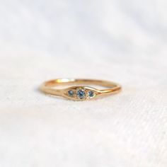 Trio Ring Montana Sapphire Dainty Wedding Ring Set Gold, Rings That Fit Together, Timeless Three Stone Ring In 14k Gold, Elegant Three Stone Birthstone Ring In 14k Gold, Elegant Three-stone Birthstone Ring In 14k Gold, Dainty 14k Gold Three-stone Jewelry, Timeless 14k Gold Stackable Rings With Gemstones, Delicate 14k Gold Three-stone Jewelry, Timeless 14k Gold Stackable Gemstone Rings