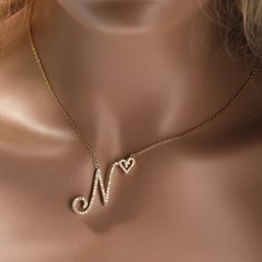 Initial Cursive Letters with Heart Pendant Necklaces Collier Upgrade your jewelry collection with our Initial Cursive Letters with Heart Pendant Necklaces. Crafted with attention to detail, this necklace is a stylish and meaningful accessory that adds a personalized touch to your look. Metals Type: Copper Necklace Type: Pendant Necklaces Material: Cubic Zirconia Shape/pattern: Letter Pendant Size: 2.3cm*2.2cm Chain Type: Link Chain Item Type: Necklaces Available Colors: Silver, Gold, Rose Gold E Rose Gold Initial Necklace, Heart Pendant Necklace Gold, Rose Gold Initial, Backdrops Necklace, Alphabet Necklace, Custom Initial Necklace, Necklace Name, Cursive Letters, Initial Necklace Gold