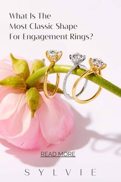 two engagement rings sitting on top of a pink flower with the words, what is the most classic shape for engagement rings? read more style