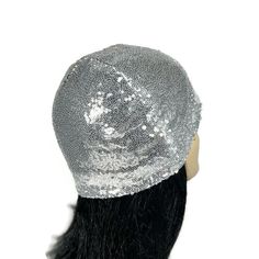 Silver Sequined Beanie Silver Skullcap Sequin Skullcap Glam Skullcap Beanie Sequin Toque Silver Helmet Flapper Sequin Hat Sequin Chemo Hats PLEASE READ COMPLETE LISTING TO GET THE DESIRED FIT New on trend sequin skull cap...FITS TIGHT TO THE HEAD...very flattering. Faux sequin dots are glued to black mesh fabric.  Stretches to fit head circumference. Lined in fabric of your choice, black 100% cotton jersey knit or black silky spandex Casual wear or dressy...have fun with it Measure around the head where you want the brim of the hat to fit.  Skull cap will stretch TIGHTLY to that measurement. If you prefer a looser fit, order a larger size.  Please message me with any questions or concerns. Skull cap measures 7.5-8"  top to bottom edge.  Please message me if you would like it longer. FYI... Party Mini Cap Hat One Size, Party Mini Cap Hat, Party Mini Cap, Party Bonnet Cap, One Size Fits Most, Party Bonnet Cap (one Size Fits Most), Party Bonnet Cap One Size Fits Most, Party Bonnet Cap, Fitted Costume Hats And Headpieces For Winter Festival, Fitted Party Bonnet Cap