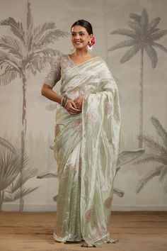 Shop pista green tissue silk sari online in USA with embroidered blouse. Make a fashion statement on festive occasions and weddings with designer suits, Indian dresses, Anarkali suits, palazzo suits, designer sarees, sharara suits, Bollywood saris from Pure Elegance Indian fashion store in USA.-full view Chanderi Saree With Unstitched Blouse In Pista Green, Pista Green Chanderi Saree With Unstitched Blouse, Unstitched Tissue Silk Blouse Piece In Pista Green, Designer Tussar Silk Blouse Piece In Pista Green, Pista Green Art Silk Saree With Zari Work, Pista Green Art Silk Pre-draped Saree With Zari Work, Pista Green Pre-draped Art Silk Saree With Zari Work, Pista Green Pre-draped Saree For Wedding, Luxury Pista Green Embroidered Saree