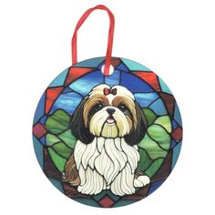 a stained glass ornament with a dog on it