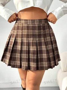 Style:Casual \nType:Pleated \nDetails:Pleated \nDetails:Zipper \nColor:Brown \nPattern Type:Plaid \nWaist Line:High Waist \nLength:Mini \nTemperature:Spring/Fall (18-25℃/63-77℉) \nFit Type:Regular Fit \nFabric:Non-Stretch \nMaterial:Woven Fabric \nComposition:100% Polyester \nCare Instructions:Machine wash or professional dry clean \nSheer:No \n Brown Plaid Skirt, Winter Formal Dress, Plaid Print Skirt, Ooga Booga, Plaid Pleated Mini Skirt, Dress Up Jeans, Cute Skirt Outfits, Printed Pleated Skirt, Plus Size Vintage