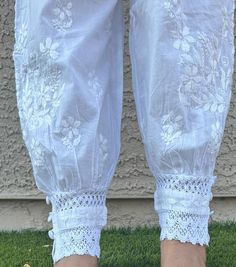 Beautiful Lucknow Chikankari ankle length Afghani  pants to give you a stylish look with your Lucknowi Kurtis or ethnic Kurtis.These pants have elastic  on the waist and dori to tie in the front. Attractive lace at the bottom. One size pant that's fits S ,M,L sizes. Fits ( US 4-6 to US 10-12sizes) Traditional Embroidered Ankle-length Bottoms, Festive Fitted Casual Pants, White Ankle-length Harem Pants, Spring Cotton Bottoms With Lace Work, Bohemian Chikankari Embroidery Bottoms For Summer, Traditional Ankle-length Bottoms With Elastic Waistband, Traditional White Bottoms, Traditional White Long Pants, Traditional White Fitted Bottoms