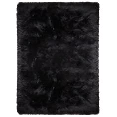 a black area rug on a white background